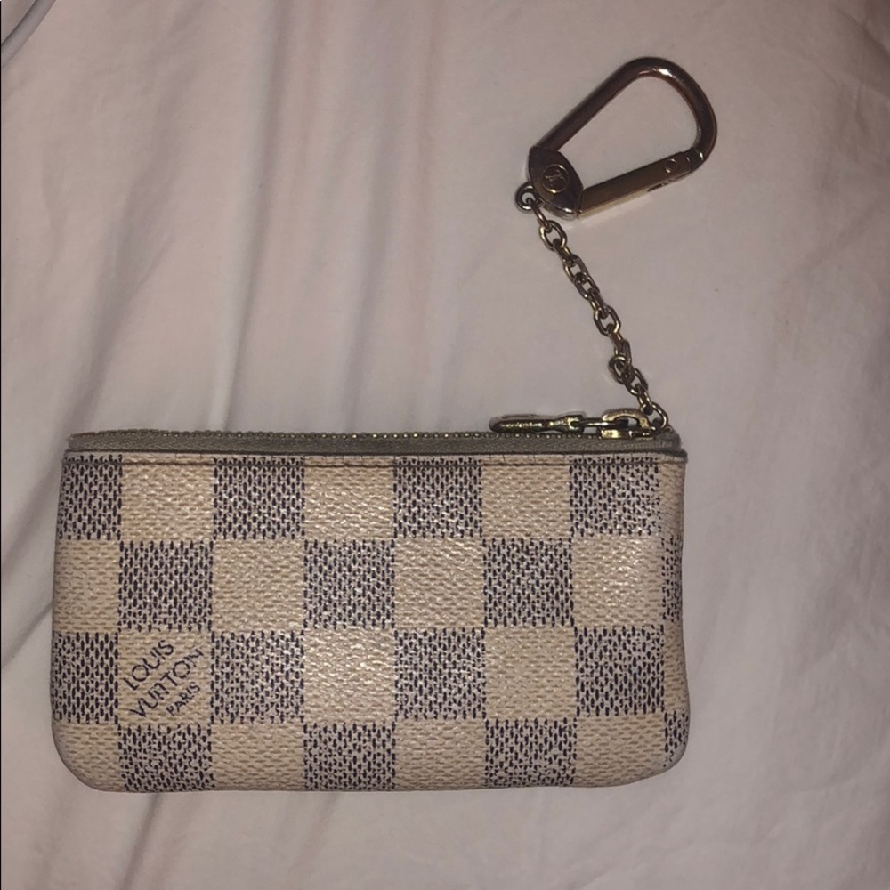 Louis Vuitton key chain wallet. Very Used.